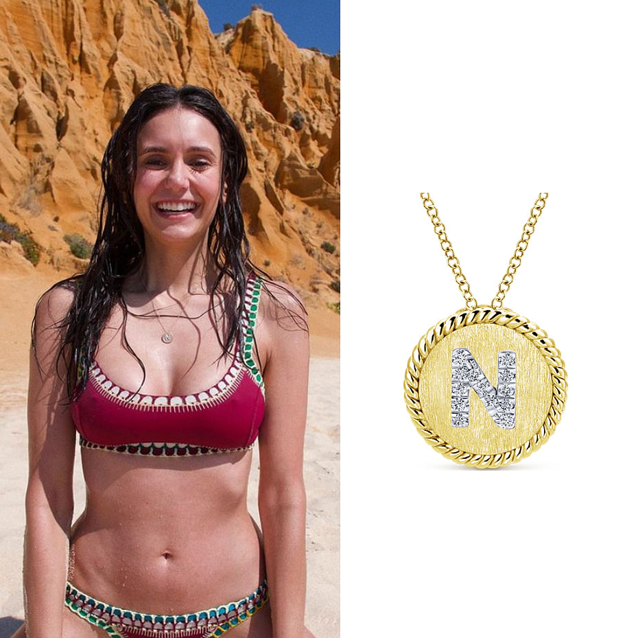 August 2021 Actress Nina Dobrev (24M) wearing Gabriel & Co’s 18K Yellow-White Gold Round Diamond Initial Pendant Necklace