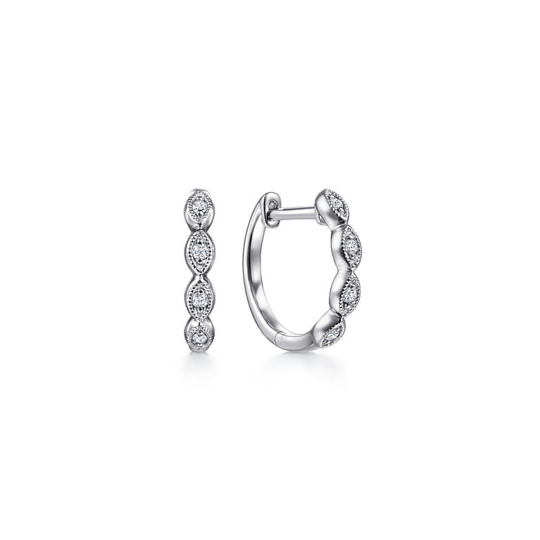 14K White Gold Diamond Huggie Earrings - 0.06 ct - Shot 1