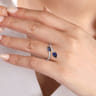 14K White Gold Diamond and Blue Sapphire Bypass Ring - 0.25 ct