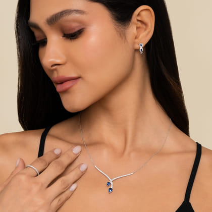 14K White Gold Diamond and Blue Sapphire Teardrop Twist Necklace