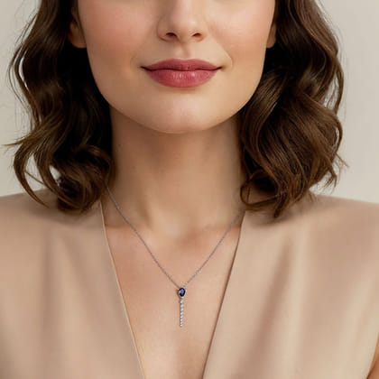 14K White Gold Graduating Diamonds and Blue Sapphire Pendant Drop Necklace