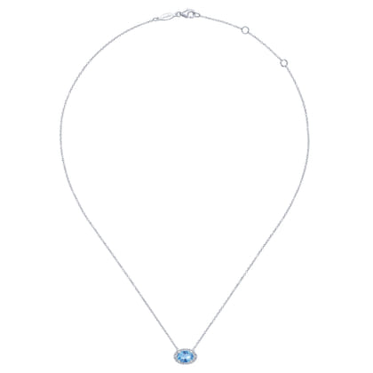 14K White Gold Oval Blue Topaz and Diamond Halo Pendant Necklace