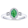 14K White Gold Oval Emerald and Diamond Halo Three Stone Ring - 0.25 ct