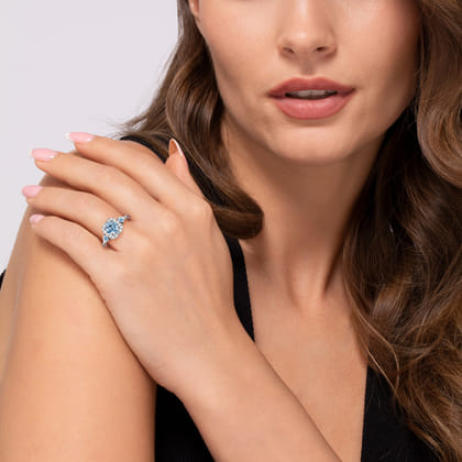 14K White Gold Three Stone Blue Topaz and Diamond Halo Ring