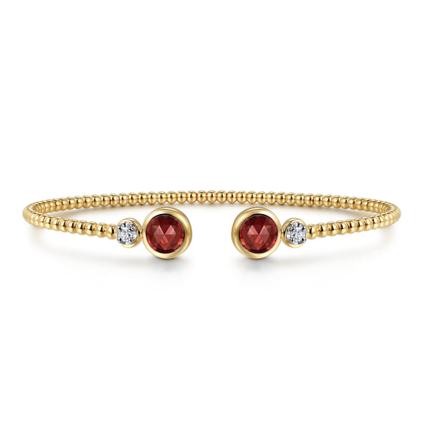 Two-Tone Gold Bujukan Diamond and Garnet Bangle