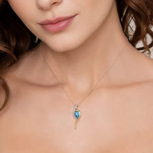 14K White and Yellow Gold Diamond and Pear Shape Blue Topaz Bypass Pendant Necklace
