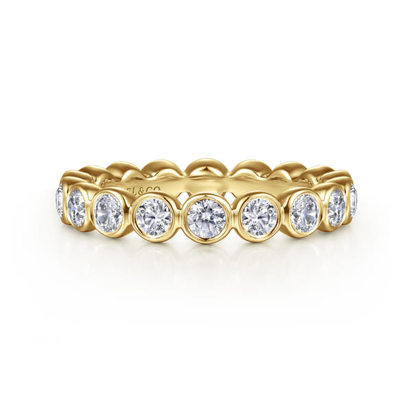 Bezel Set Diamond Eternity Band in Yellow Gold