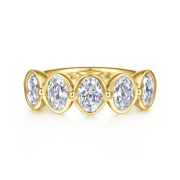 Straight Wedding Ring in 14k Yellow Gold with Oval Natural Diamond at Gabriel & Co. - Shot 1