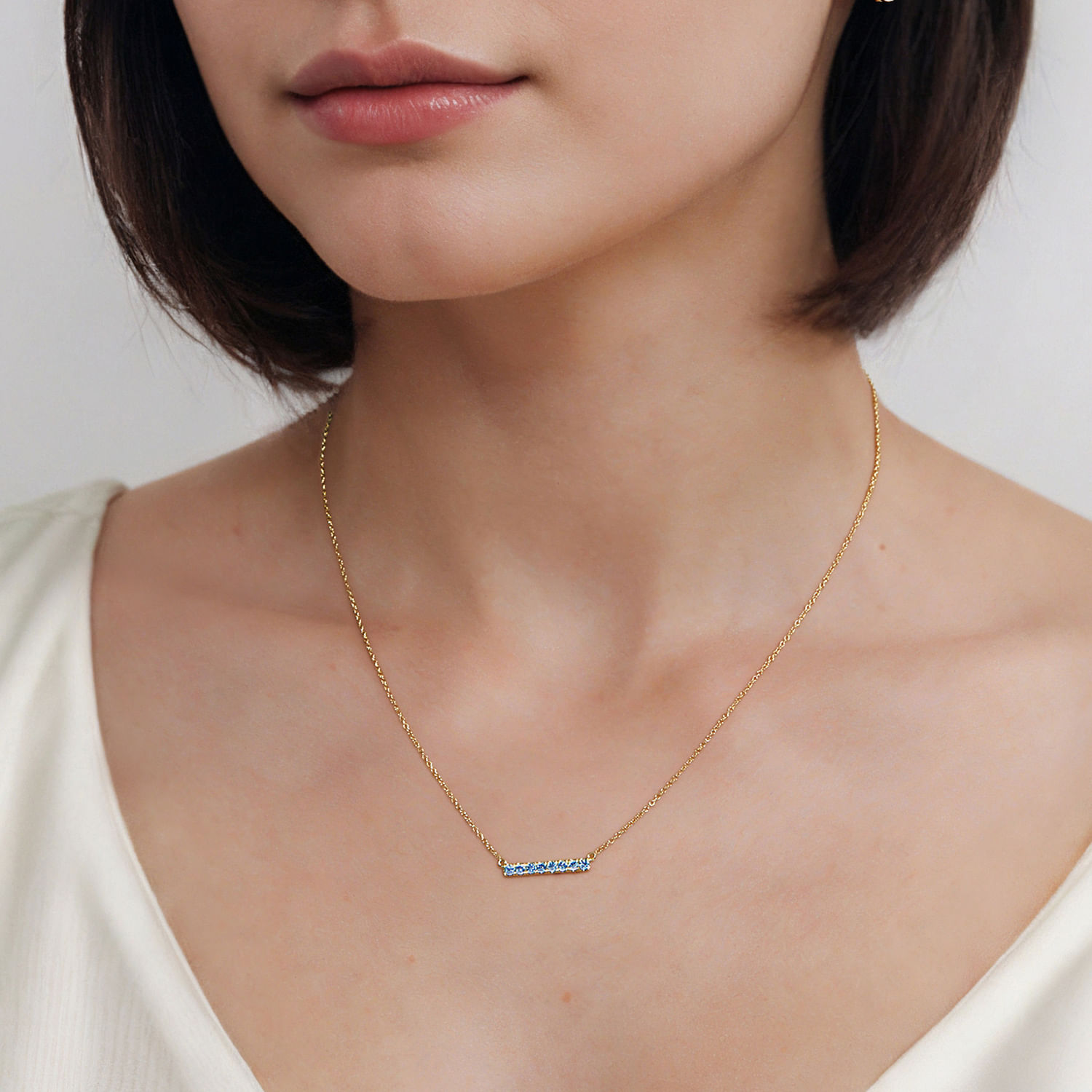 14K Yellow Gold Blue Topaz Bar Necklace @ $650. Shop