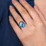 14K Yellow Gold Blue Topaz Round Shape Ladies Ring With Flower Pattern J-Back