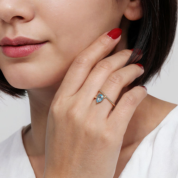 14K Yellow Gold Bujukan And Blue Topaz Bypass Ring