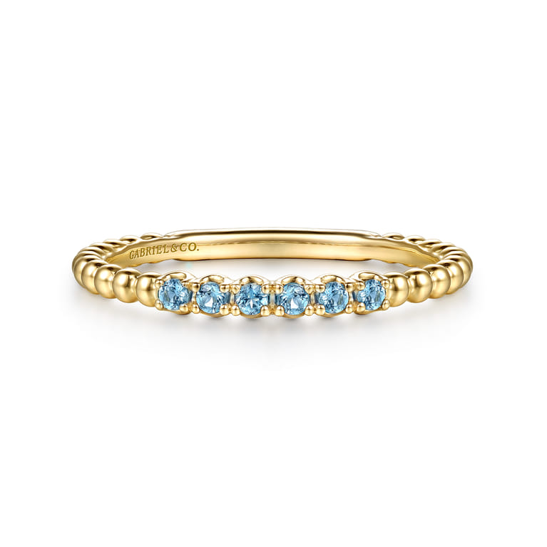 14K Yellow Gold Bujukan Bead and Blue Topaz Stackable Ring - Shot 1