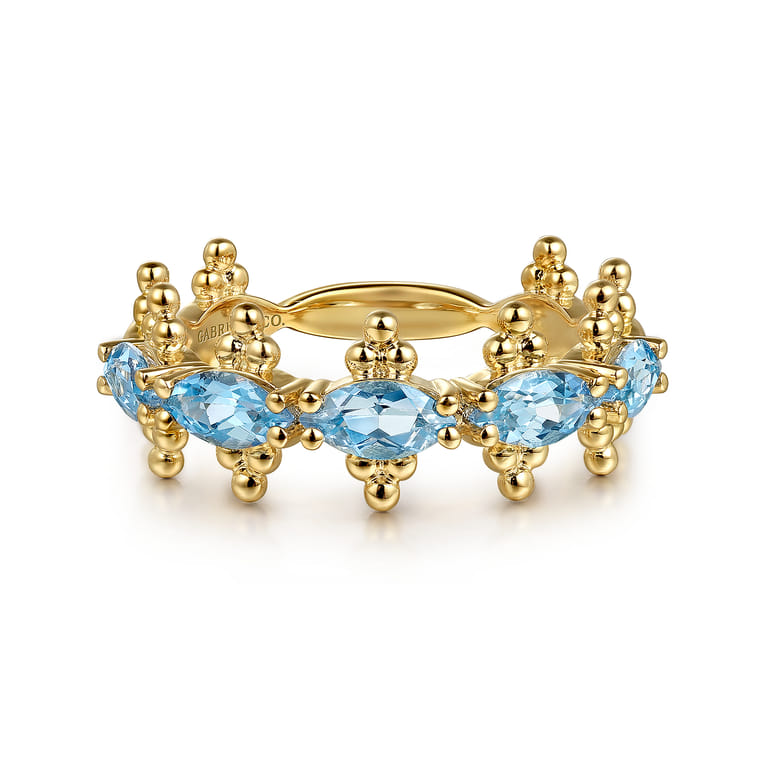 14K Yellow Gold Bujukan Blue Topaz Fashion Ring - Shot 1