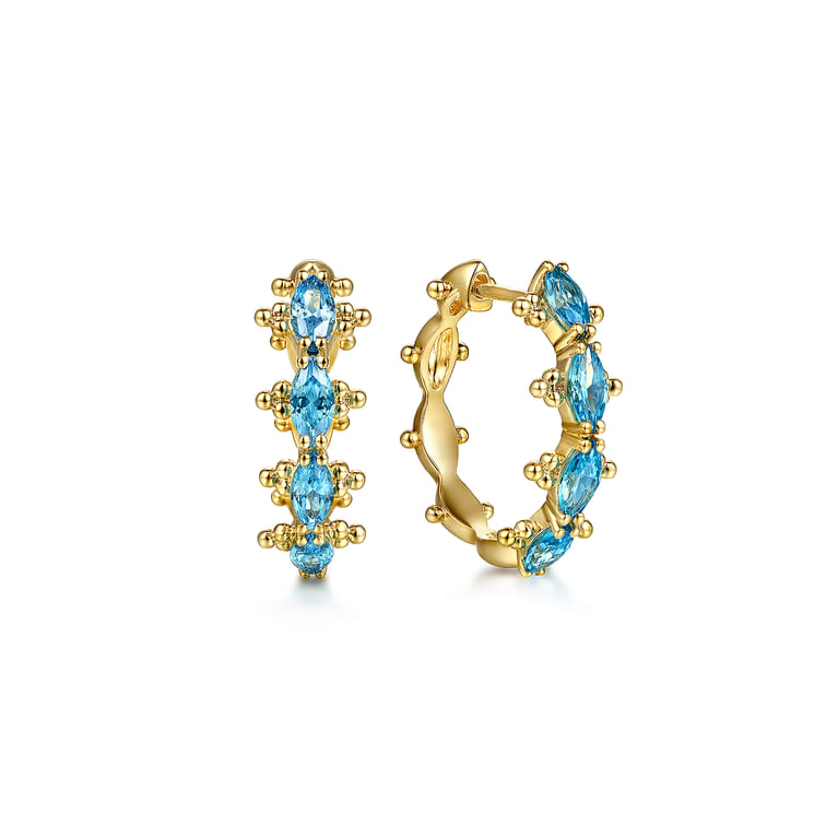 14K Yellow Gold Bujukan Blue Topaz Huggie Earrings - Shot 1