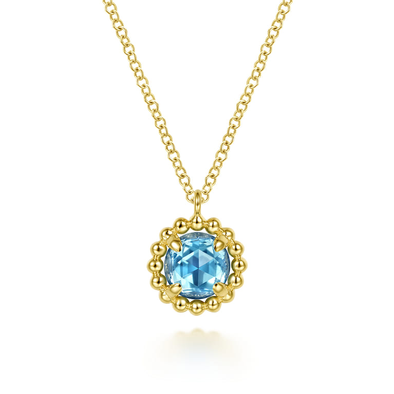 14K Yellow Gold Bujukan Blue Topaz Pendant Necklace - Shot 1