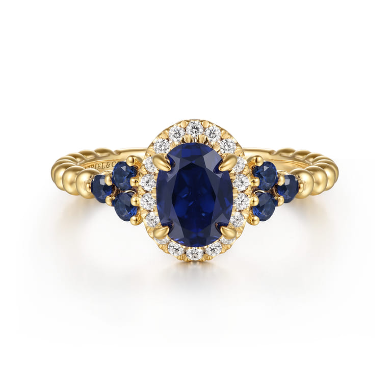 14K Yellow Gold Bujukan Diamond Halo and Oval Blue Sapphire Fashion Ring - 0.1 ct - Shot 1