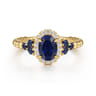 14K Yellow Gold Bujukan Diamond Halo and Oval Blue Sapphire Fashion Ring - 0.1 ct