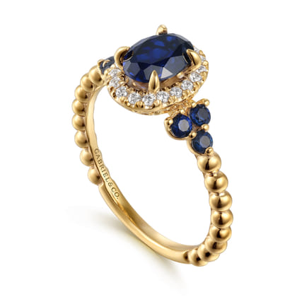 14K Yellow Gold Bujukan Diamond Halo and Oval Blue Sapphire Fashion Ring