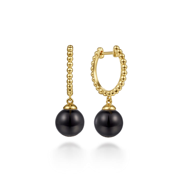 14K Yellow Gold Bujukan Huggie Earrings with Onyx Drops - Shot 1