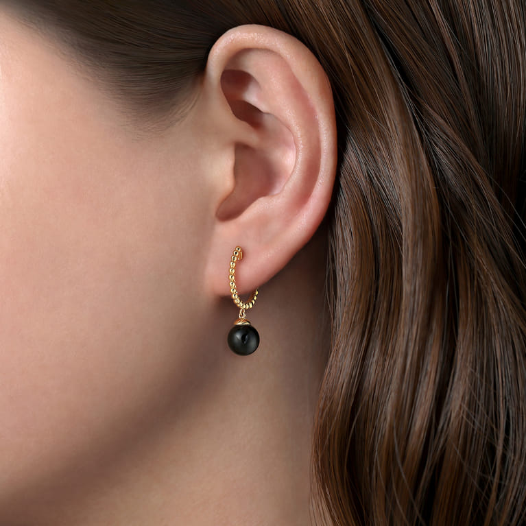 14K Yellow Gold Bujukan Huggie Earrings with Onyx Drops - Shot 2