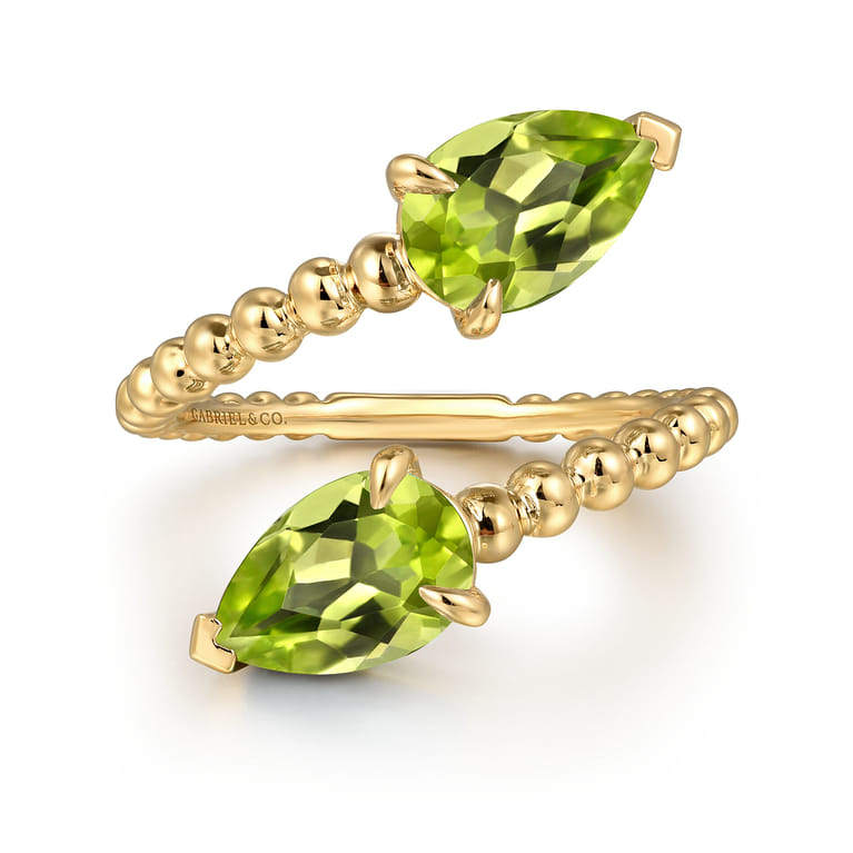 14K Yellow Gold Bujukan Peridot Bypass Ladies Ring - Shot 1