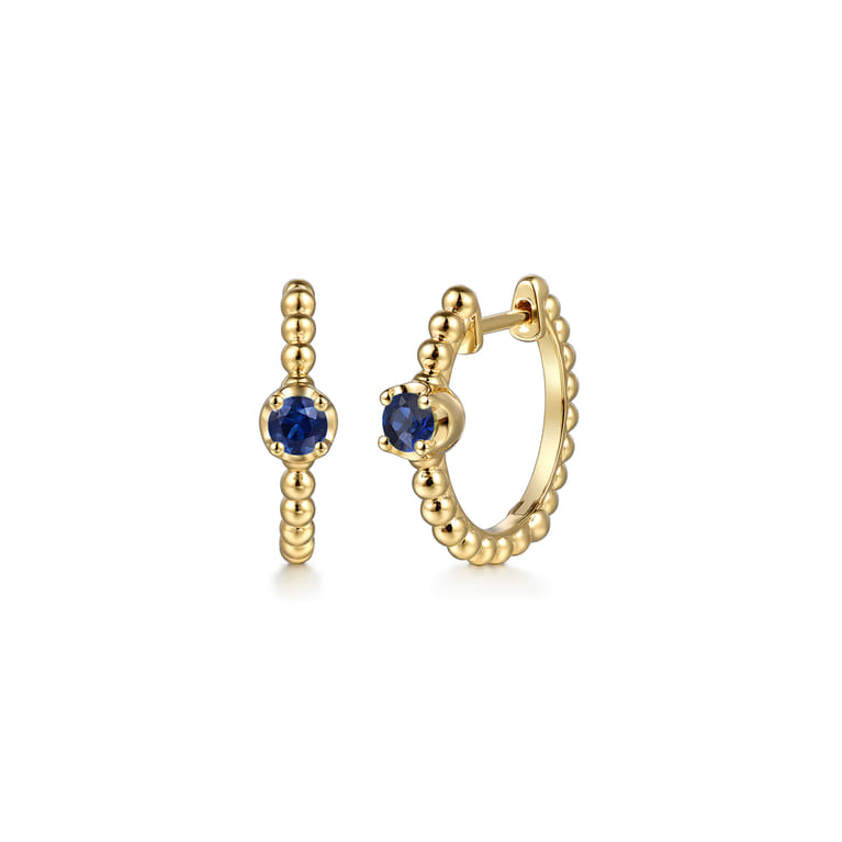 14K Yellow Gold Bujukan Sapphire 15mm Huggie Earrings - Shot 1