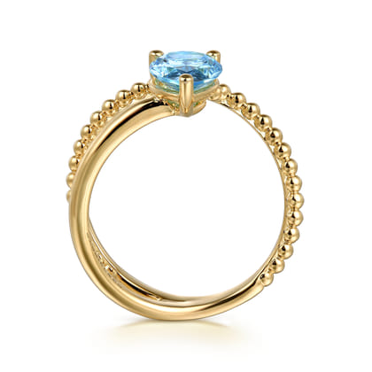 14K Yellow Gold Bujukan and Blue Topaz Bypass Ring