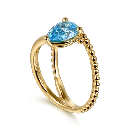 14K Yellow Gold Bujukan and Blue Topaz Bypass Ring