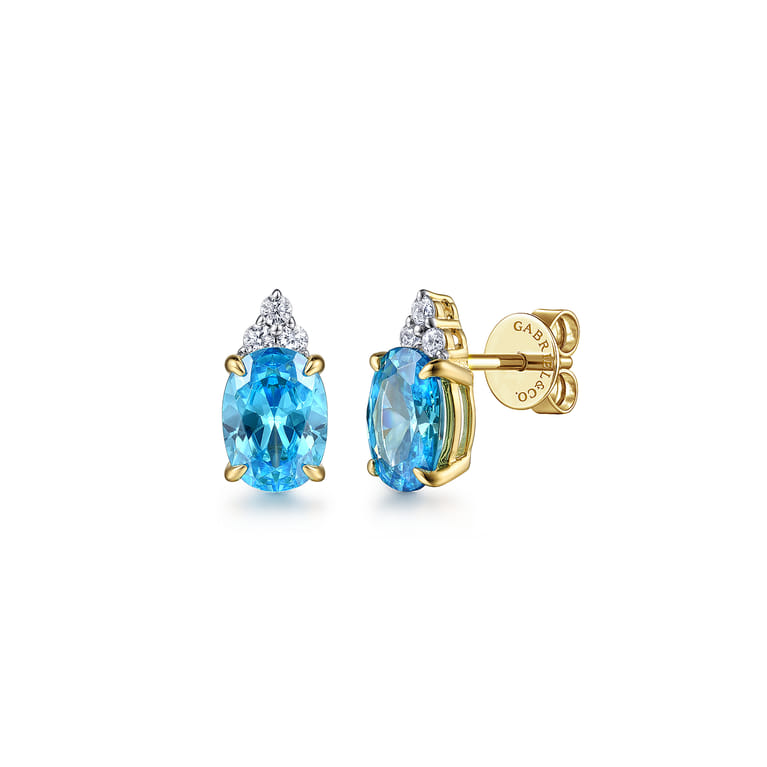 14K Yellow Gold Diamond And Swiss Blue Topaz Stud Earrings - 0.09 ct - Shot 1