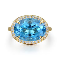 14K Yellow Gold Diamond and Oval Shape Blue Topaz Ladies Ring With Flower Pattern Gallery