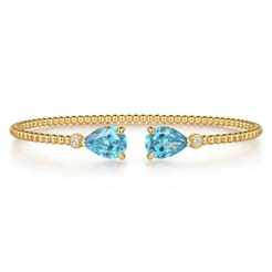 14K Yellow Gold Diamond and Pear Shape Blue Topaz Bujukan Bangle