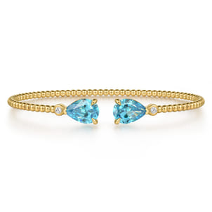 14K Yellow Gold Diamond and Pear Shape Blue Topaz Bujukan Bangle