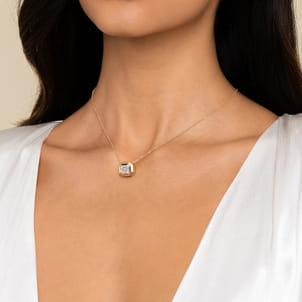 14K Yellow Gold Geometric Baguette and Round Diamond Pendant Necklace