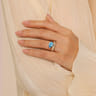 14K Yellow Gold Graduating Bujukan Pear Blue Topaz Curved Ring