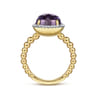 14K Yellow Gold Oval Amethyst and Diamond Halo Ring - 0.16 ct