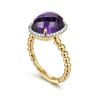 14K Yellow Gold Oval Amethyst and Diamond Halo Ring - 0.16 ct