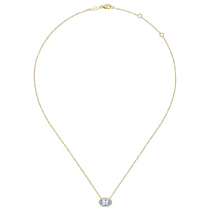 14K Yellow Gold Oval Aquamarine and Diamond Halo Pendant Necklace