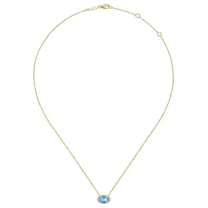 14K Yellow Gold Oval Blue Topaz and Diamond Halo Pendant Necklace