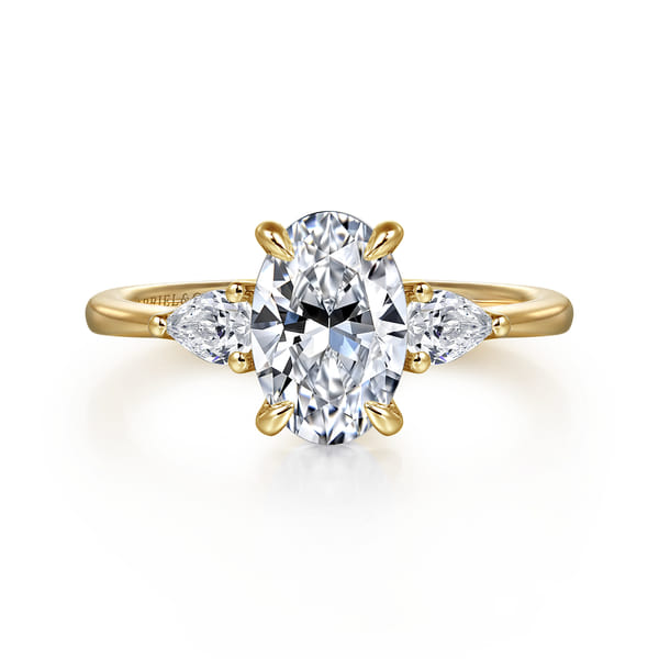 Oval Three Stone Diamond Engagement Ring in Yellow Gold