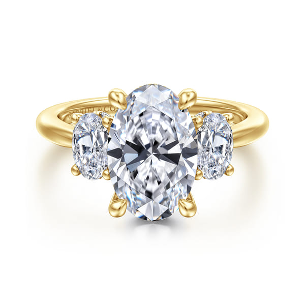 Oval Three Stone Diamond Engagement Ring in Yellow Gold