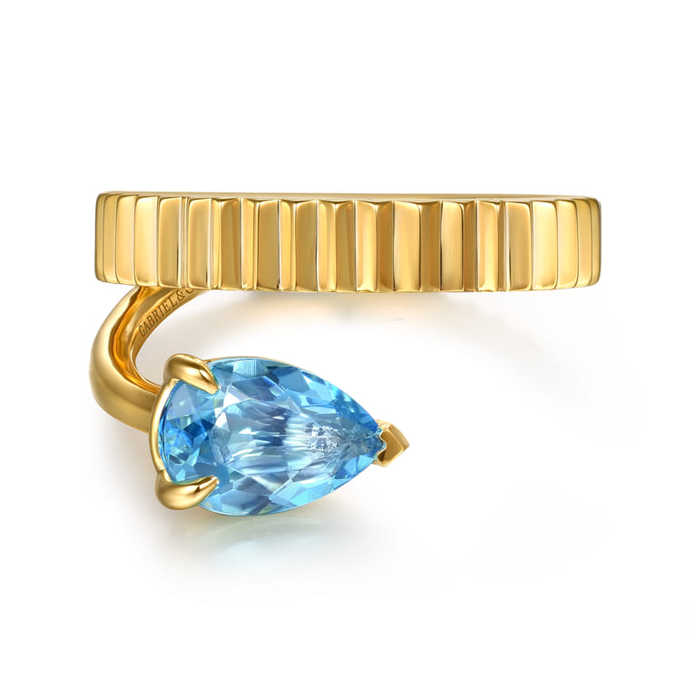 14K Yellow Gold Pear Shape Blue Topaz and Diamond Cut Ladies Ring - Shot 1