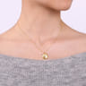 14K Yellow Gold Round Locket Pendant Necklace with Diamond Star Center - 0.03 ct