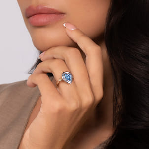 14K Yellow Gold and 925 Sterling Silver Bujukan Pear Blue Topaz Cocktail Ring