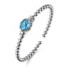 14K Yellow Gold and 925 Sterling Silver Oval Blue Topaz Bujukan Open Bangle Bracelet