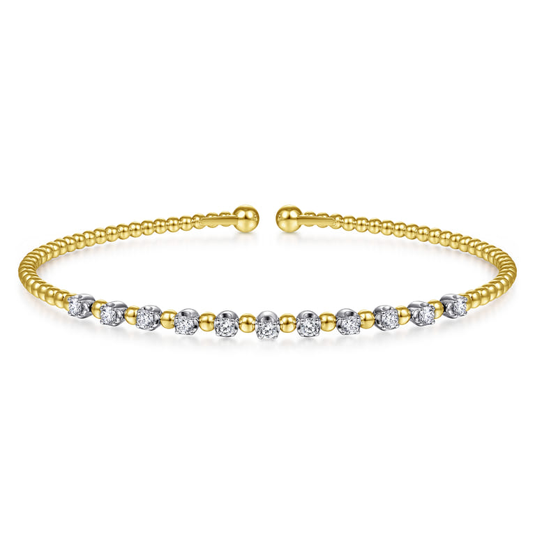 18K Yellow Gold Bujukan Split Cuff Bracelet with Round White Gold Diamond Stations in size 6.25 - Shot 1