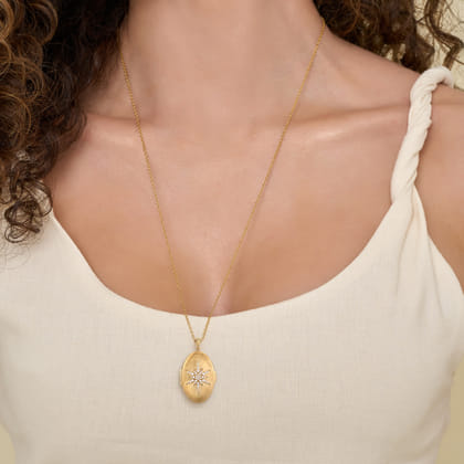 25 inch 14K Yellow Gold Oval Locket Necklace with Diamond Starburst Overlay
