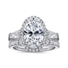 Briela - 14K White Gold Oval Cut Three Stone Halo Diamond Engagement Ring - 0.64 ct
