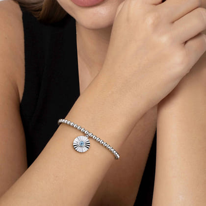925 Sterling Silver Bujukan Beaded Bezel Set Blue Topaz and Diamond Cut Charm Bangle Bracelet