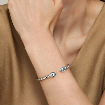 925 Sterling Silver Bujukan and Pear Shape Blue Topaz Split Bangle Bracelet