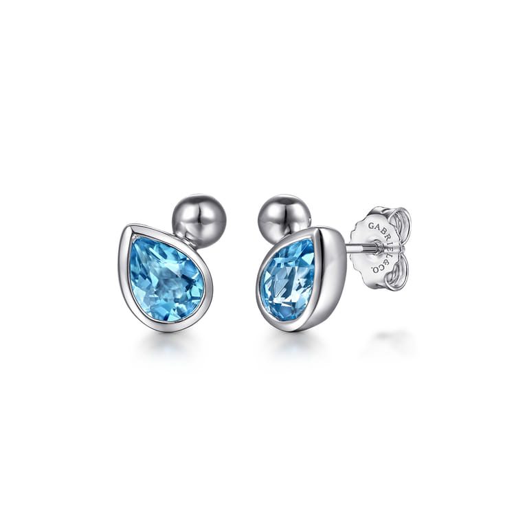 925 Sterling Silver Pear Blue Topaz Bujukan Stud Earrings - Shot 1